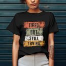 Premium Unisex Crewneck T-Shirt – 'Tired But Still Trying' Graphic Tee