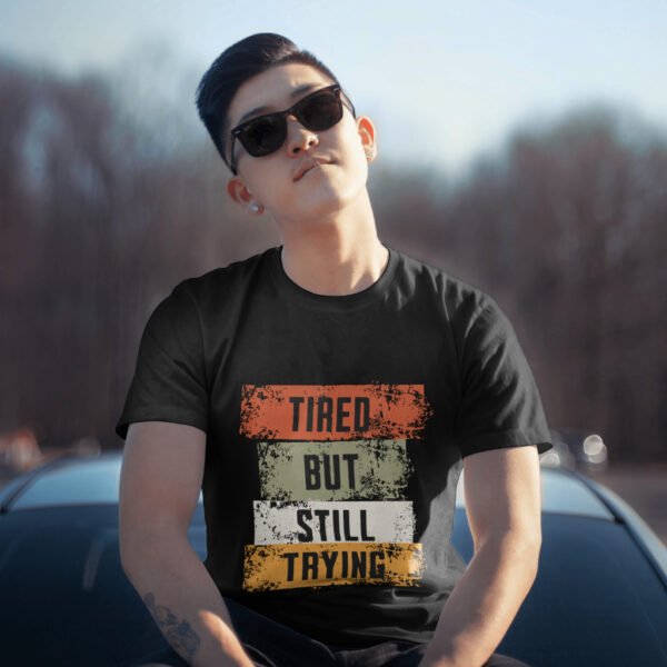 Premium Unisex Crewneck T-Shirt – 'Tired But Still Trying' Graphic Tee - Image 2
